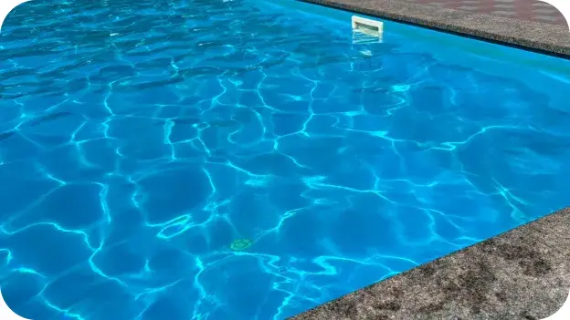 Close-up of clear, rippling pool water.