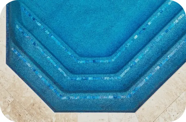 Close-up of the raised spa's hexagonal blue-tiled steps.